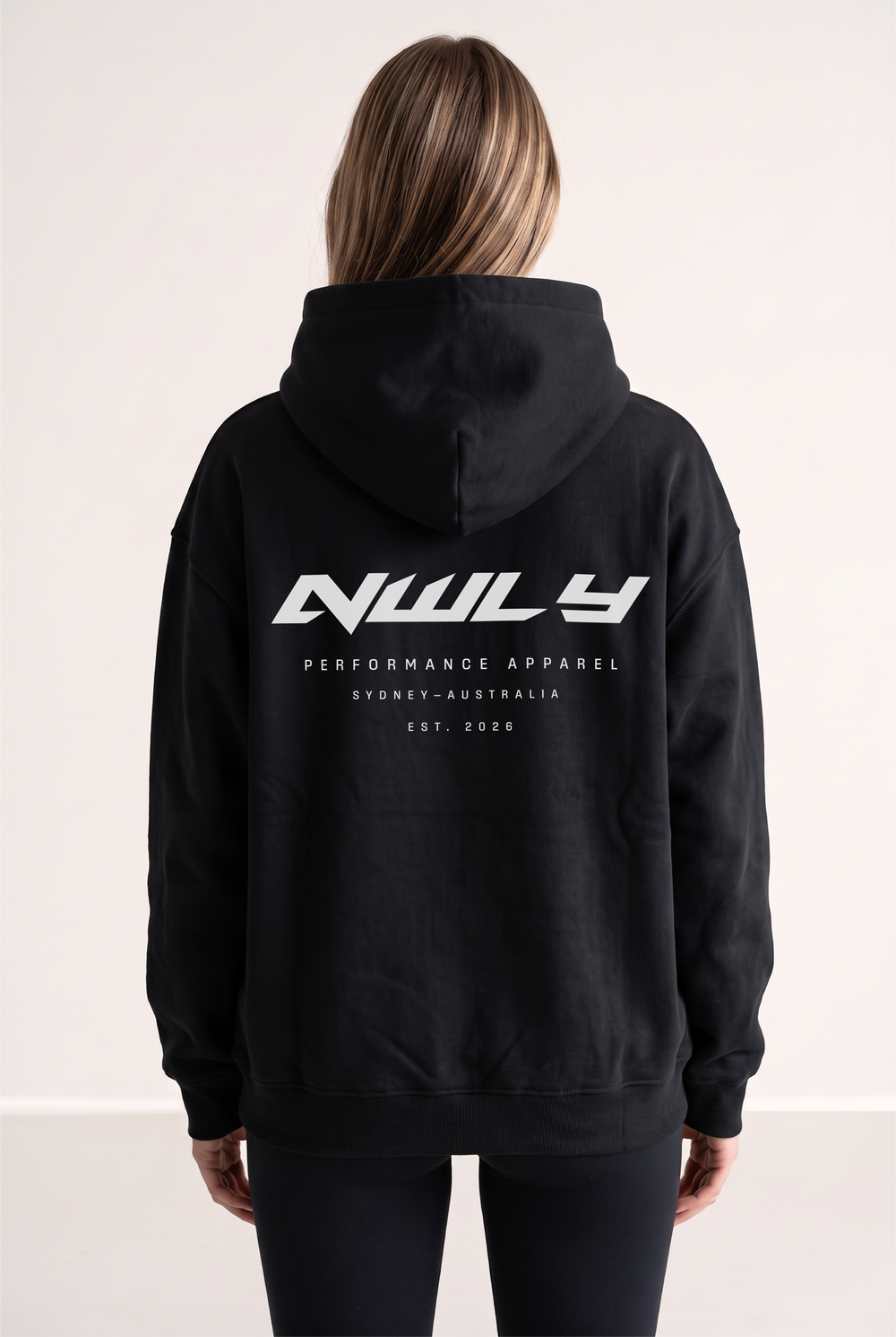 NWLY black oversized performance hoodie, rear graphic view