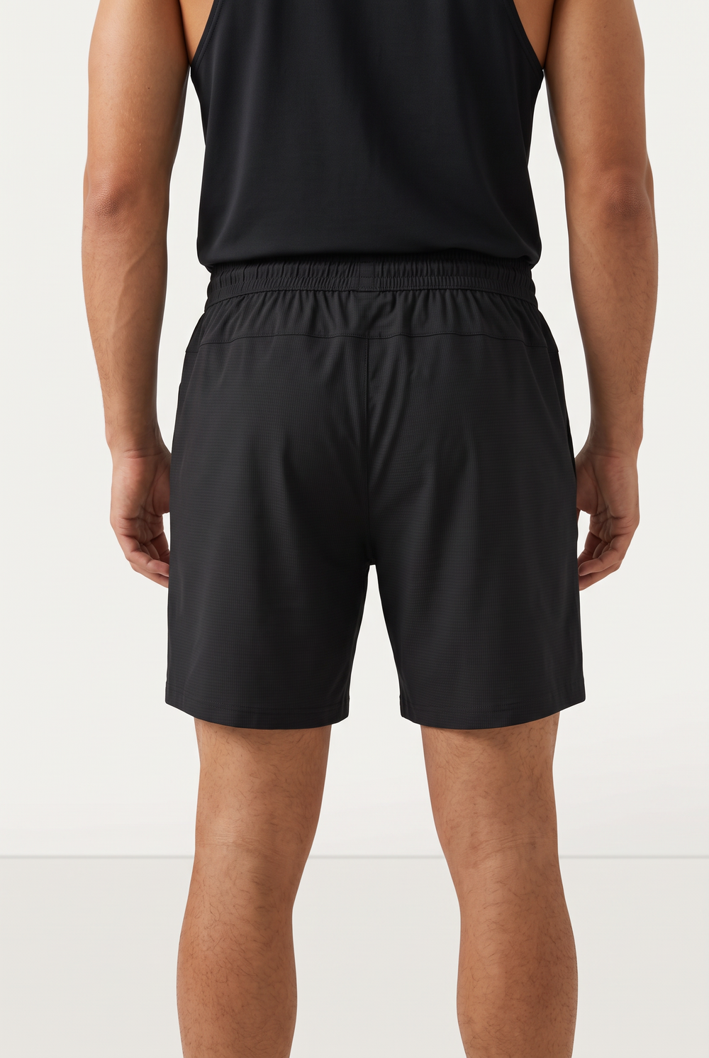 NWLY black performance training shorts, rear view